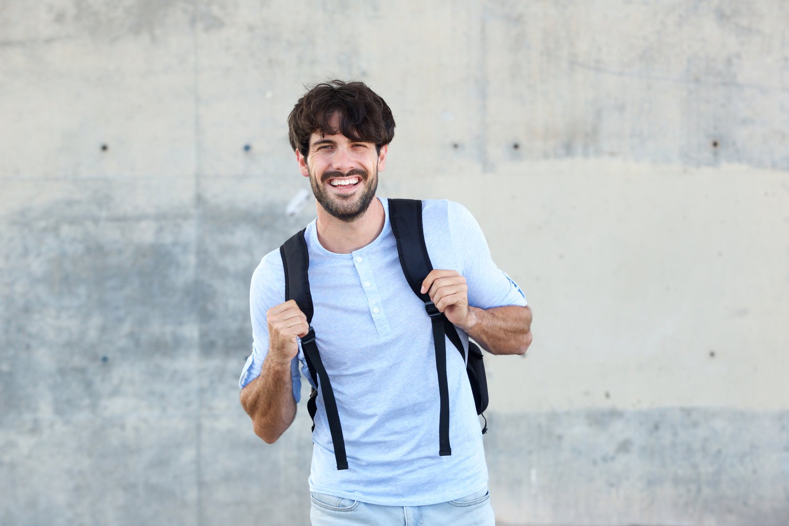 Handsome Man with Bag Smiling